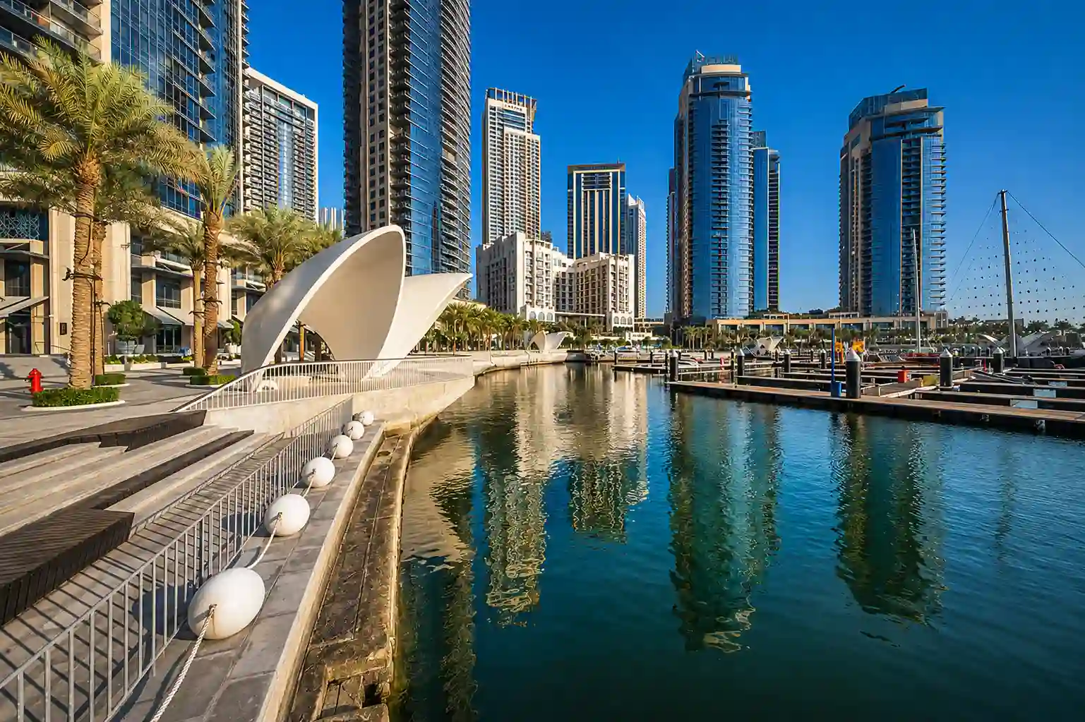 Dubai Creek Harbour marina with waterfront towers and yachts in Dubai