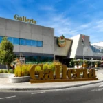 Galleria Mall Al Barsha exterior view in Dubai with entrance and retail stores visible.